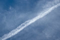 Airplane trail in the blue sky royalty free stock photography Airplane trail in the blue sky royalty free stock photography