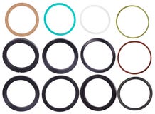 Ajuste das gaxetas diferentes isolaled no fundo branco Selos do óleo para os cilindros hidráulicos para industrial fotografia de stock Ajuste das gaxetas diferentes isolaled no fundo branco Selos do óleo para os cilindros hidráulicos para industrial fotografia de stock