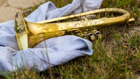 All one needs for the evening a sweatshirt and their Flugelhorn stock photos All one needs for the evening a sweatshirt and their Flugelhorn stock photos