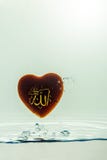 `allah` god of Islam with symbol Water splash with bubbles of air, on the white background stock images `allah` god of Islam with symbol Water splash with bubbles of air, on the white background stock images