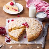 Almond And Raspberry Cake, Bakewell Tart. Traditional British Pastry. Wooden Background. Royalty Free Stock Images Almond And Raspberry Cake, Bakewell Tart. Traditional British Pastry. Wooden Background. Royalty Free Stock Images