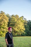 Alternative white male man with pink hair gazing in the distance, contemplative royalty free stock photos Alternative white male man with pink hair gazing in the distance, contemplative royalty free stock photos