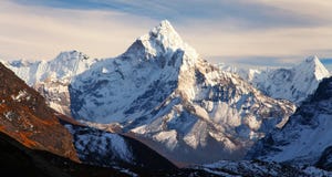 Ama Dablam with beautiful clouds stock photo Ama Dablam with beautiful clouds stock photo