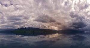 Amazing cloud over the mountains. dramatic storm over the lake and mountains. Hiking Adventure royalty free stock photos Amazing cloud over the mountains. dramatic storm over the lake and mountains. Hiking Adventure royalty free stock photos