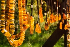 Amber pendants and necklaces at the street market of Curonian Spit, Kaliningrad region
