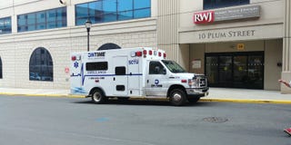 Ambulance parked outside hospital royalty free stock photo Ambulance parked outside hospital royalty free stock photo