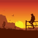 American Cowboy On Wild West Sunset Landscape In The Evening Royalty Free Stock Images