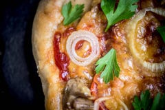 American pizza on wooden board and various ingredients. American style pizzerias. royalty free stock photography American pizza on wooden board and various ingredients. American style pizzerias. royalty free stock photography