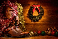 Amerikanische Westrodeo-Cowboystiefel-Weihnachtskarte lizenzfreie stockbilder Amerikanische Westrodeo-Cowboystiefel-Weihnachtskarte lizenzfreie stockbilder