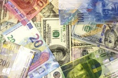 Amerikansk dollar, euro och schweizisk franc för pengarbakgrund arkivbilder Amerikansk dollar, euro och schweizisk franc för pengarbakgrund arkivbilder