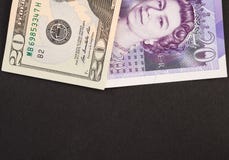 Amerykański dolar i anglicy walimy banknoty obraz stock Amerykański dolar i anglicy walimy banknoty obraz stock