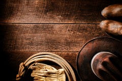 Amerykański Zachodni rodeo przekładni i kowbojskiego kapeluszu tło