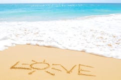 Amor em uma praia exótica imagem de stock Amor em uma praia exótica imagem de stock
