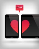 Amor no dispositivo Foto de Stock Amor no dispositivo Foto de Stock