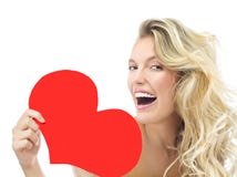 Amor vermelho do ` s do Valentim do coração da mulher da beleza imagem de stock royalty free Amor vermelho do ` s do Valentim do coração da mulher da beleza imagem de stock royalty free