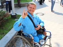 An Example Of Optimism And Strength Of Mind From A Disabled Person In A Wheelchair. Stock Images An Example Of Optimism And Strength Of Mind From A Disabled Person In A Wheelchair. Stock Images