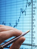 Analyzing chart on monitor Royalty Free Stock Photography Analyzing chart on monitor Royalty Free Stock Photography