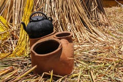Ancient ceramic stow on floating isle on lake Titicaca stock images Ancient ceramic stow on floating isle on lake Titicaca stock images