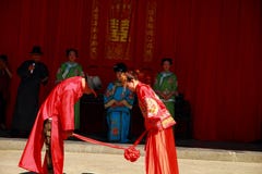 The ancient Chinese traditional wedding,bow to Heaven and Earth as part of a wedding ceremony stock photo The ancient Chinese traditional wedding,bow to Heaven and Earth as part of a wedding ceremony stock photo