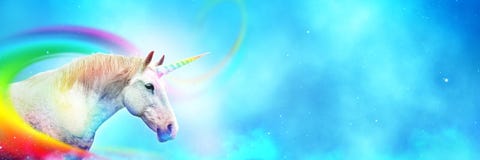 Ancient mythical unicorn with colorful rainbow