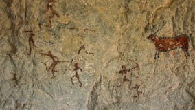Ancient rock carvings on the wall
