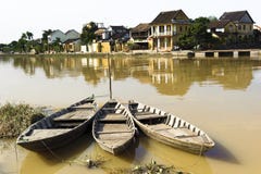Ancient Town Viewed From The River With Rowboats Royalty Free Stock Photos