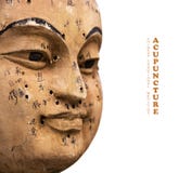 Ancient wooden face showing acupuncture points Royalty Free Stock Images Ancient wooden face showing acupuncture points Royalty Free Stock Images