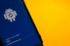 Android on blue screen. Installing system update stock photos Android on blue screen. Installing system update stock photos