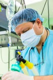 Anesthesiologist in operation room Stock Photo Anesthesiologist in operation room Stock Photo