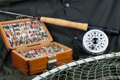 Angling Equipment and Outdoor Coat Stock Images Angling Equipment and Outdoor Coat Stock Images