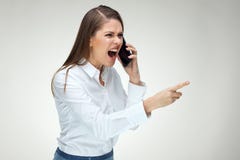 Angry Boss businesswoman emotional shouting with mobile phone. royalty free stock images Angry Boss businesswoman emotional shouting with mobile phone. royalty free stock images