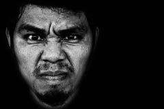 Angry Face Of Man On Black Background Royalty Free Stock Images