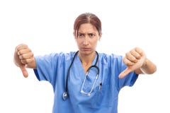 Angry unhappy woman nurse or doctor making thumbs down gesture stock images Angry unhappy woman nurse or doctor making thumbs down gesture stock images