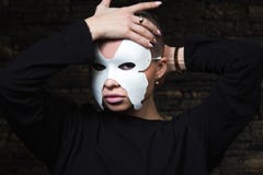 Shaved young model in mask stock photography Shaved young model in mask stock photography