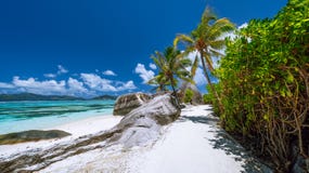 Anse Source D`Argent. Exotic Tropical Paradise Beach On Island La Digue In Seychelles. Blue Ocean And Sky, Palm Trees Royalty Free Stock Photography