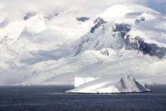 Antarctica on a Sunny day- Antarctic Peninsula - Huge Icebergs and blue sky. royalty free stock images Antarctica on a Sunny day- Antarctic Peninsula - Huge Icebergs and blue sky. royalty free stock images