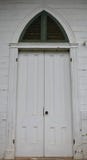Doorway with arched pediment stock images Doorway with arched pediment stock images