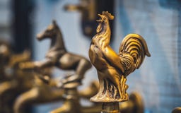 Antique Engraved Brass Chicken Sculpture stock photos Antique Engraved Brass Chicken Sculpture stock photos