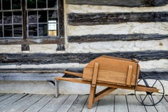 Antique Wooden Wheelbarrow, Log Cabin