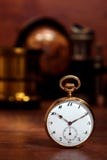 Antique Pocket Watch in Old Vintage Decor royalty free stock images Antique Pocket Watch in Old Vintage Decor royalty free stock images