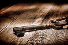Antique Skeleton Key on Old Distressed Wood Planks stock photos Antique Skeleton Key on Old Distressed Wood Planks stock photos