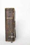 Antique Worn Leather Bible with Antique Metal and Wood Cross on