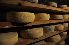 Aosta valley Italian cheese traditional cave aging storage. Stock Photos Aosta valley Italian cheese traditional cave aging storage. Stock Photos