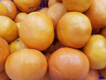 Apelsinen är en frukt för att tillbe Buddhabilder och sakral saker av den kinesiska nedstigningen på tillfället av det nya året arkivbild Apelsinen är en frukt för att tillbe Buddhabilder och sakral saker av den kinesiska nedstigningen på tillfället av det nya året arkivbild