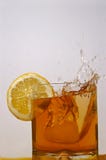 Aperitif Glass With Splashes Stock Images