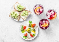 Aperitiv Table - Select And Snack, Top View. Sandwiches With Avocado, Canapé With Mozzarella, Tomatoes, Oliv Royalty Free Stock Photos Aperitiv Table - Select And Snack, Top View. Sandwiches With Avocado, Canapé With Mozzarella, Tomatoes, Oliv Royalty Free Stock Photos