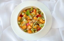 Appetizing fruit salad, on a white background stock images Appetizing fruit salad, on a white background stock images