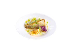 Appetizing second course of fish. Fried carp. on a white background. stock photography Appetizing second course of fish. Fried carp. on a white background. stock photography
