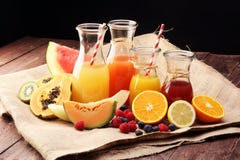 Apple And Orange Juice -several Bottles With Fruit And Berry Juices, Vintage Wooden Background, Selective Focus Stock Photos
