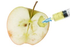 Apple And Syringe. Stock Photos
